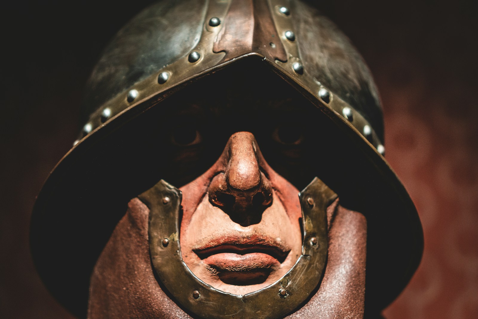 brown and grey metal helmet